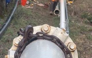 Workers busy installing 6” temporary raw water intake line